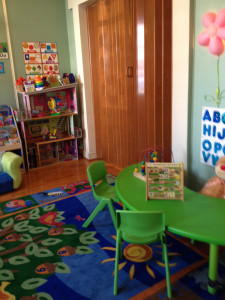 play roon in daycare in Astoria with green activity table